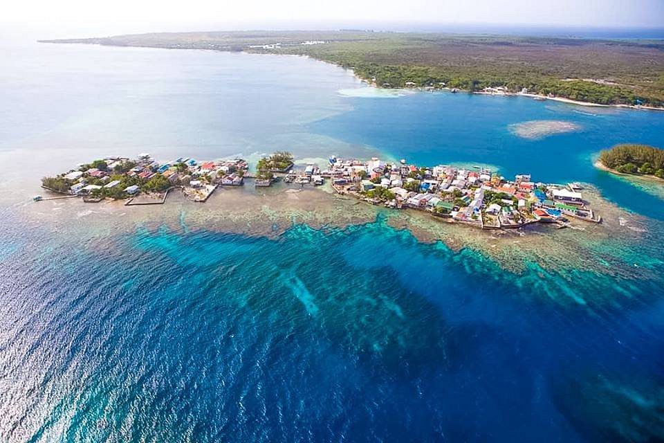 Island community and Caribbean scenery in the Utila Cays Honduras